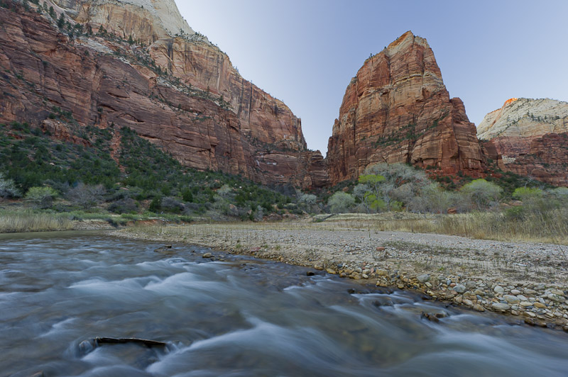 Angels Landing at sunset and Cottonwood trees along the Virgin River. The hike to the top of Angels Landing is very popular and...
