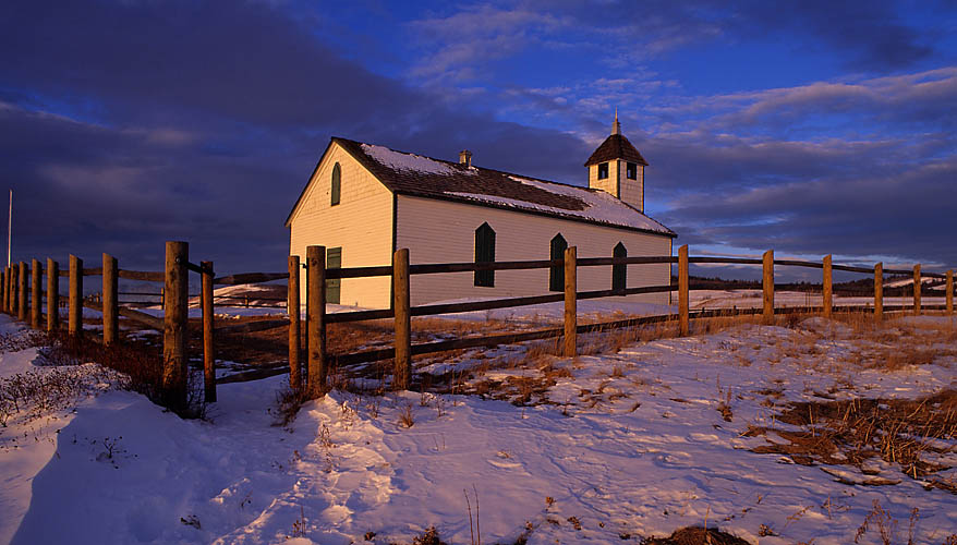 Historical church and Rocky Mountain sunrise.