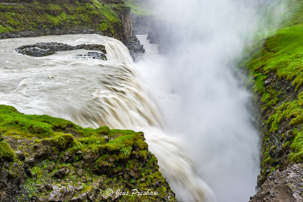 Gullfoss 'Golden Falls' drops 32 metres before thundering away down a narrow ravine.