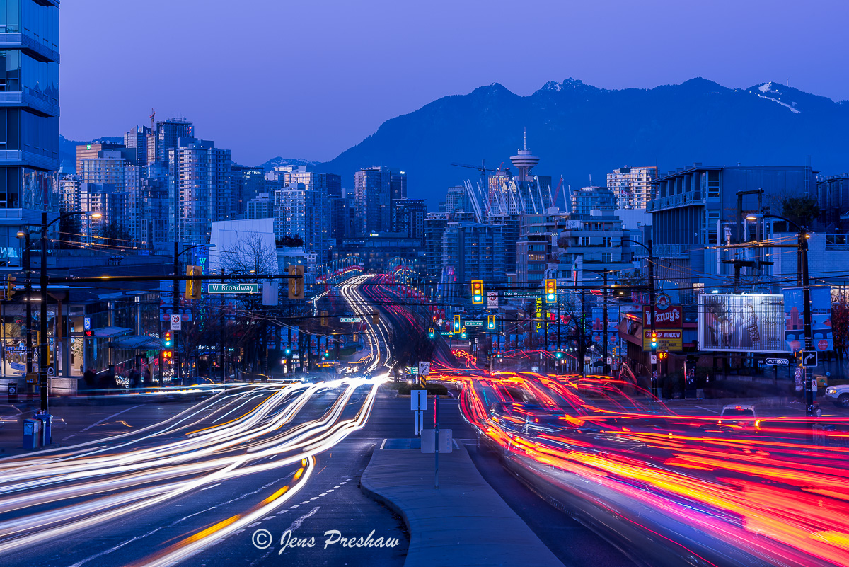 I like how this long exposure captured all three colours ( red, yellow and green ) of the traffic light.