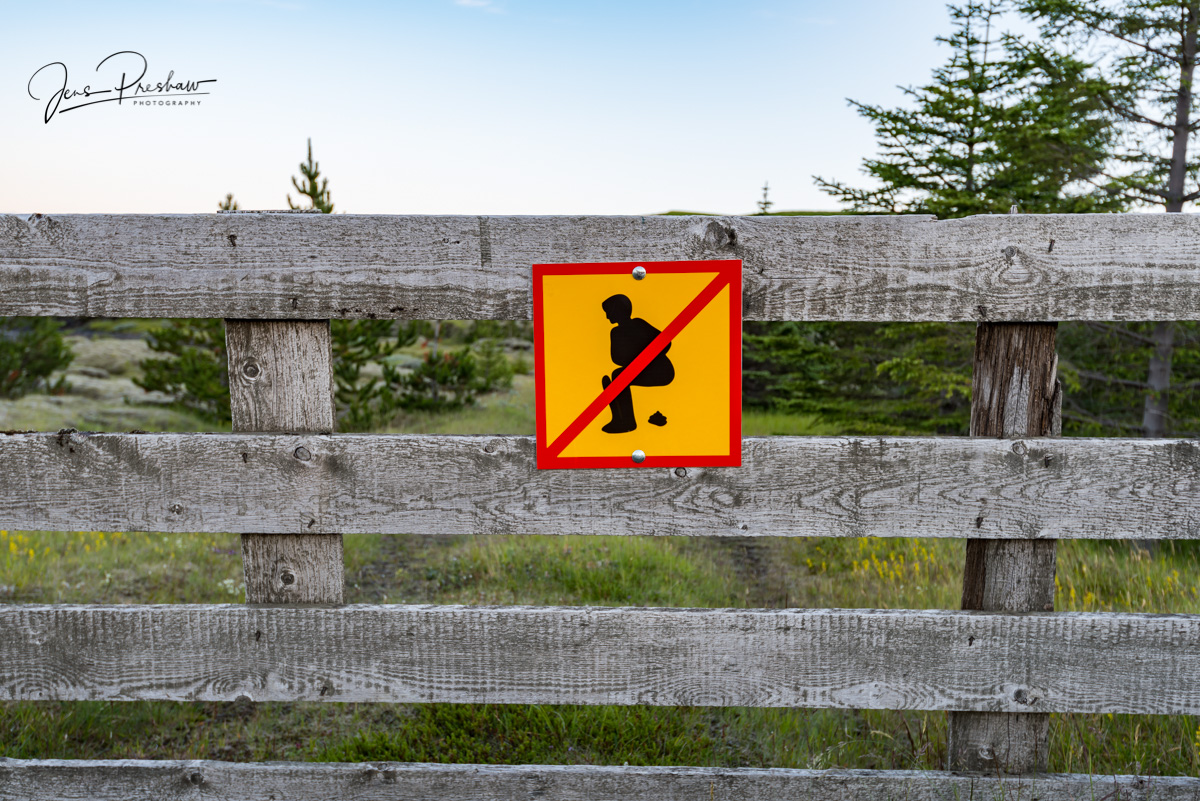 This interesting sign on a wooden fence in Iceland.
