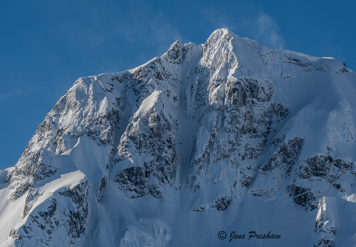 High winds create snow plumes on the summit of&nbsp;Joffre Peak ( 2721 m&nbsp;).